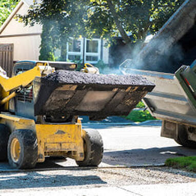 road construction asphalt repair at work